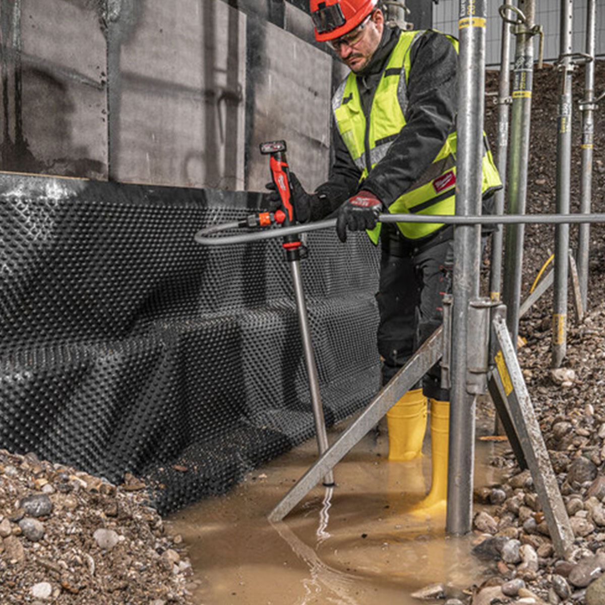 Milwaukee M12BSWP-0 12V Hydropass Stick Water Pump with 2 x 2.0Ah Battery & Charger